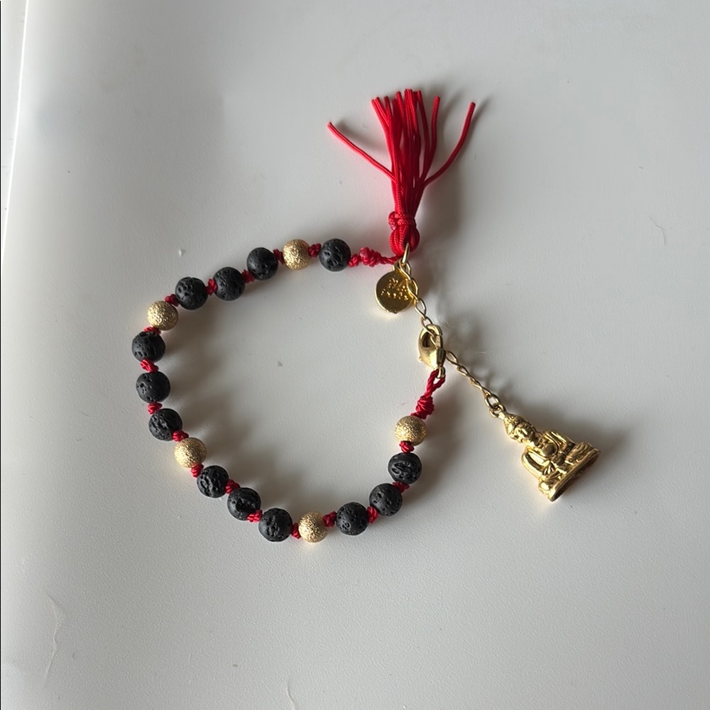 Gold and Black Beaded Bracelet with Charm